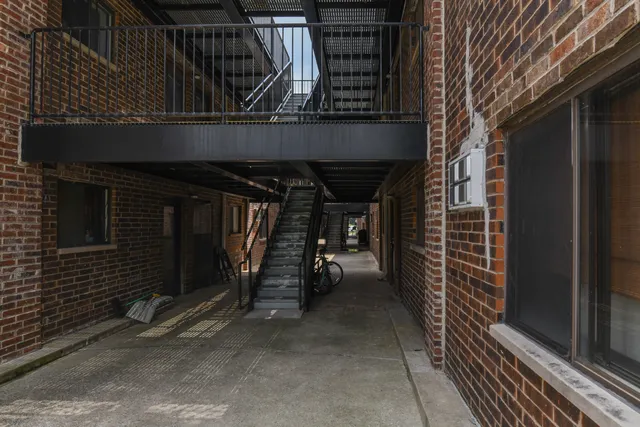 a view of a door and wooden door