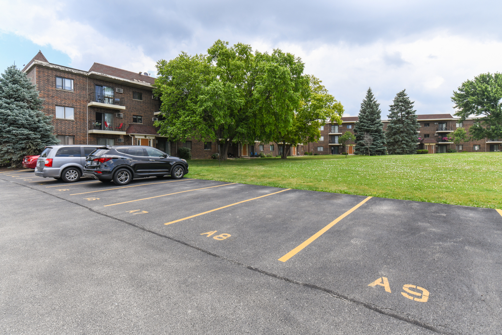 953 North Rohlwing Road, Unit GB Addison, IL 60101 - Photo 3 of 25 a view of street with parked cars