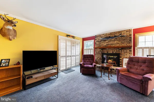 a view of a livingroom with furniture and a couch