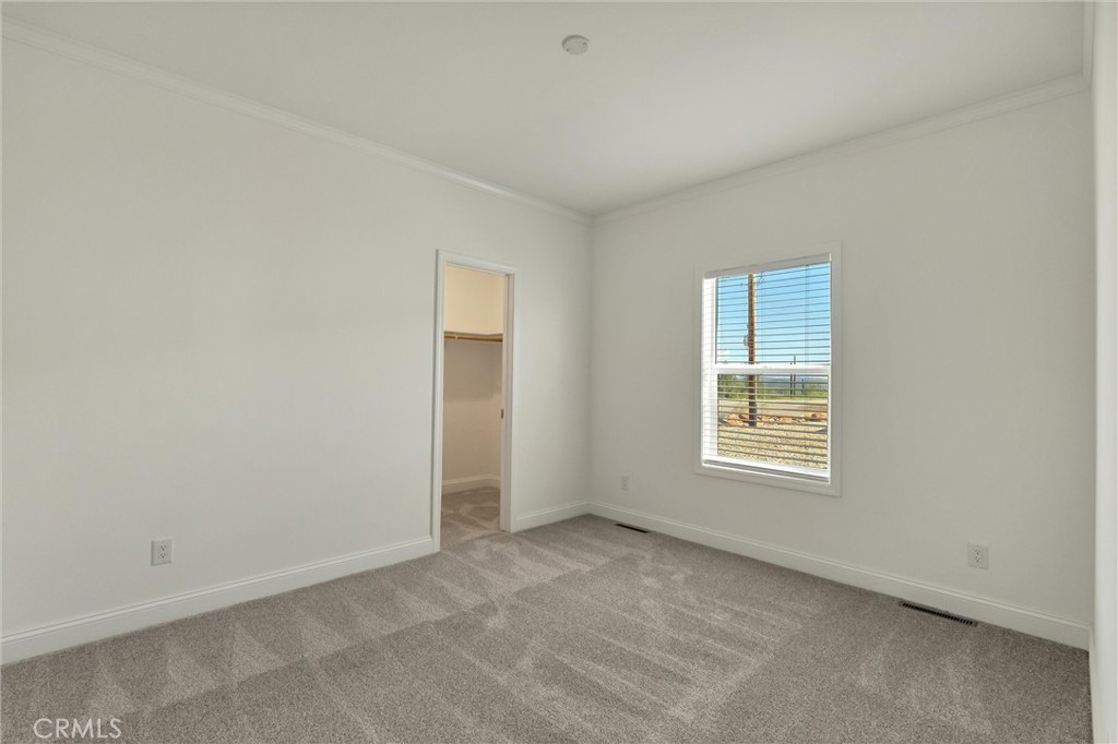 4333 Pentz Road, Unit 30 Paradise, CA 95969 - Photo 22 of 29 an empty room with windows
