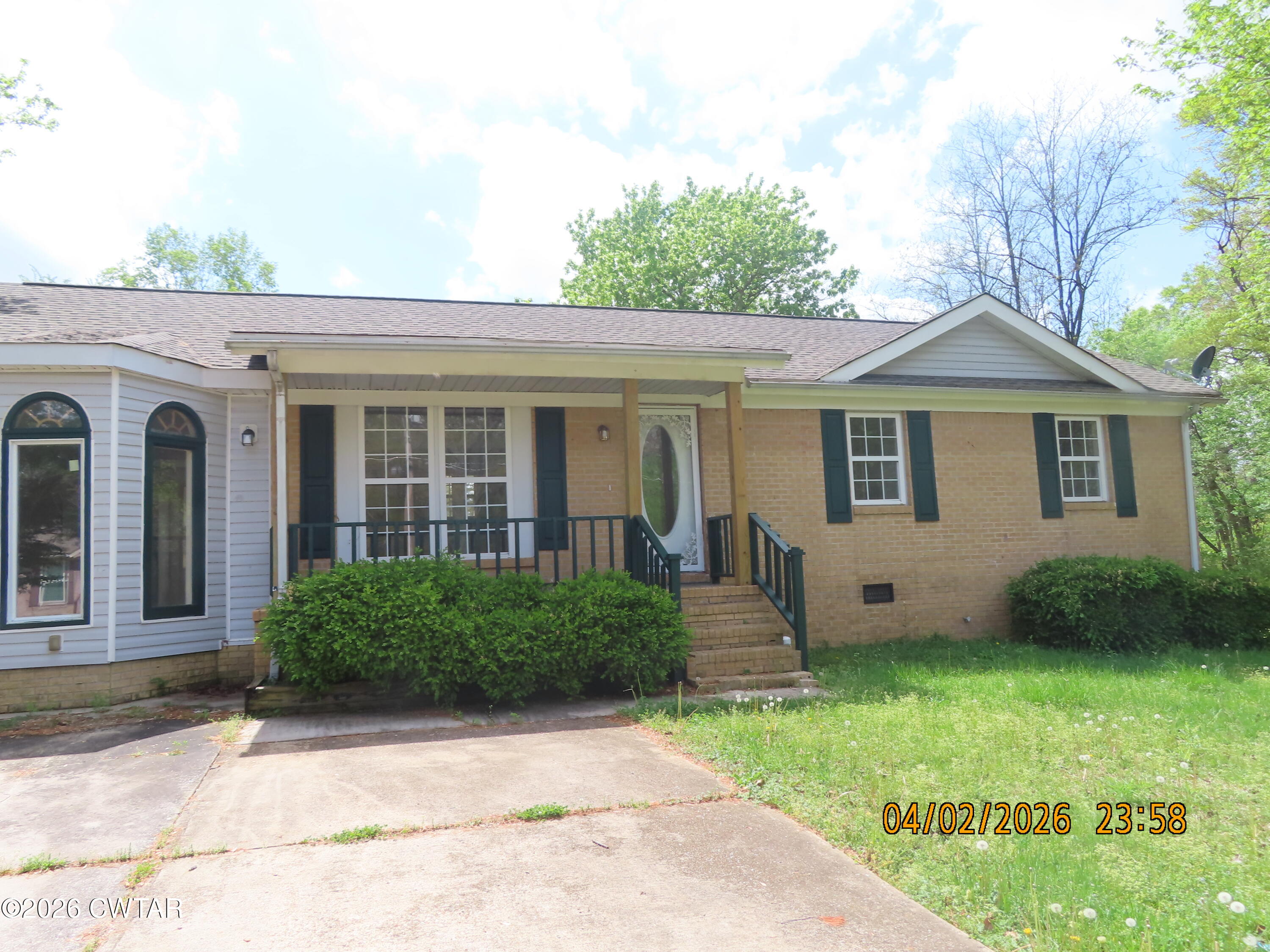 200 Cross Street Bolivar, TN 38008 - Photo 24 of 24 a front view of a house with garden