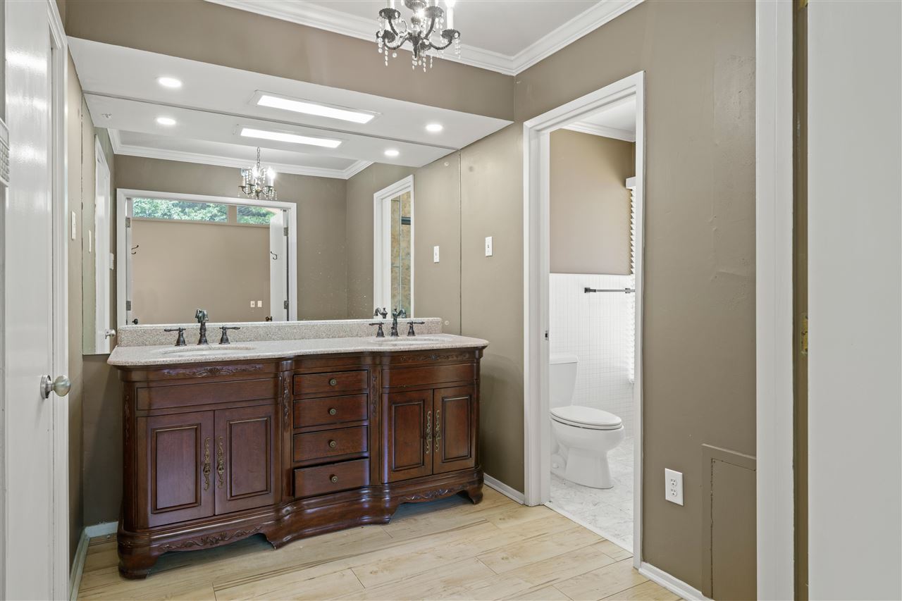 5341 Rich Road Memphis, TN 38120 - Photo 18 of 25 Updated Primary Bath with Furniture Style Double Vanity, 3 Closets, and Custom Walk-In Shower