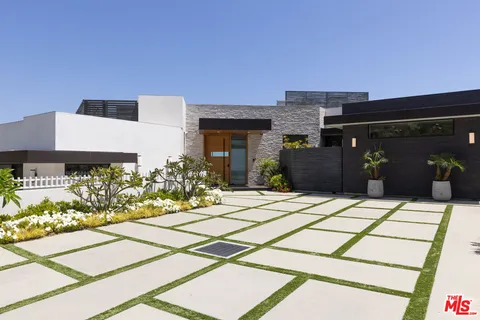 a picture of houses with a yard