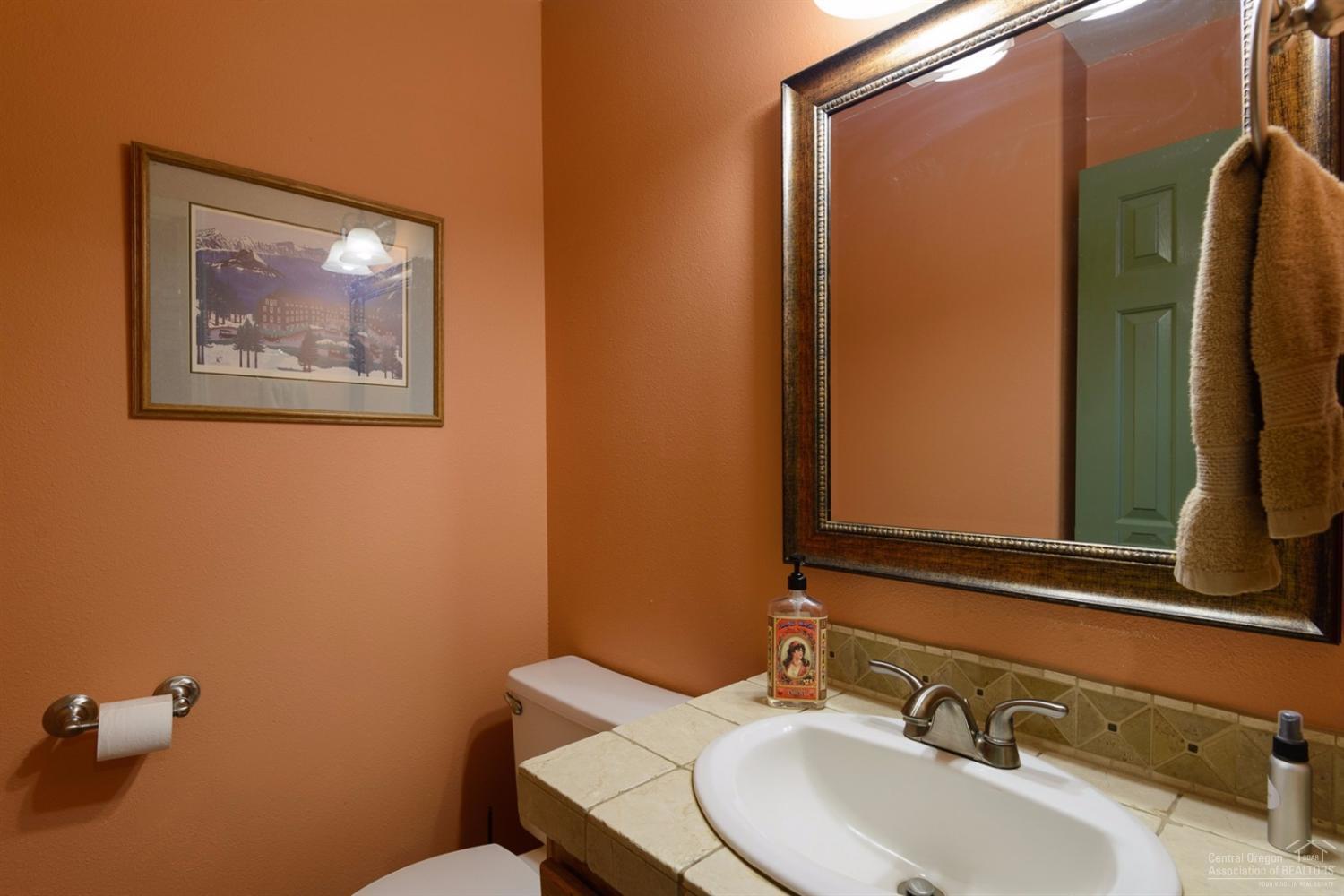 60030 Navajo Road Bend, OR 97702 - Photo 18 of 20 a bathroom with a sink and a mirror
