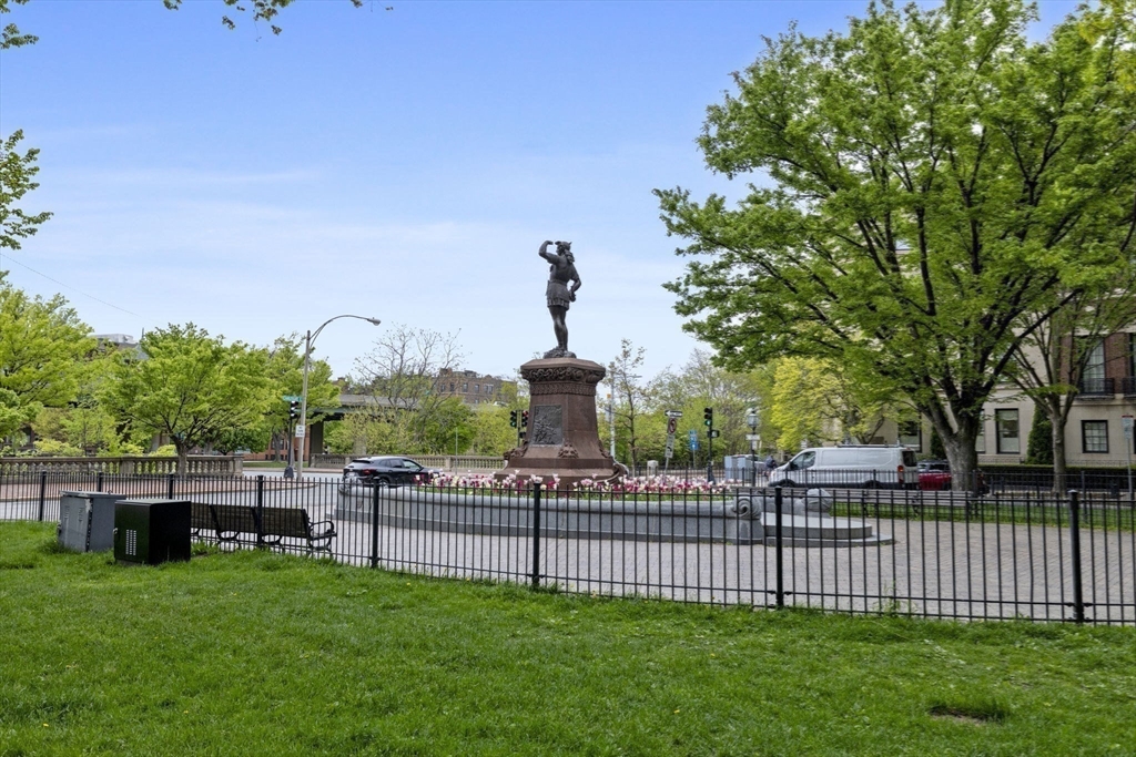 416 Commonwealth Avenue, Unit 312 Boston, MA 02215 - Photo 22 of 24 a view of a garden with a bench in the background