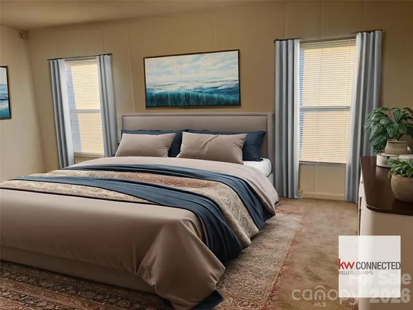 a bedroom with a bed and glass window