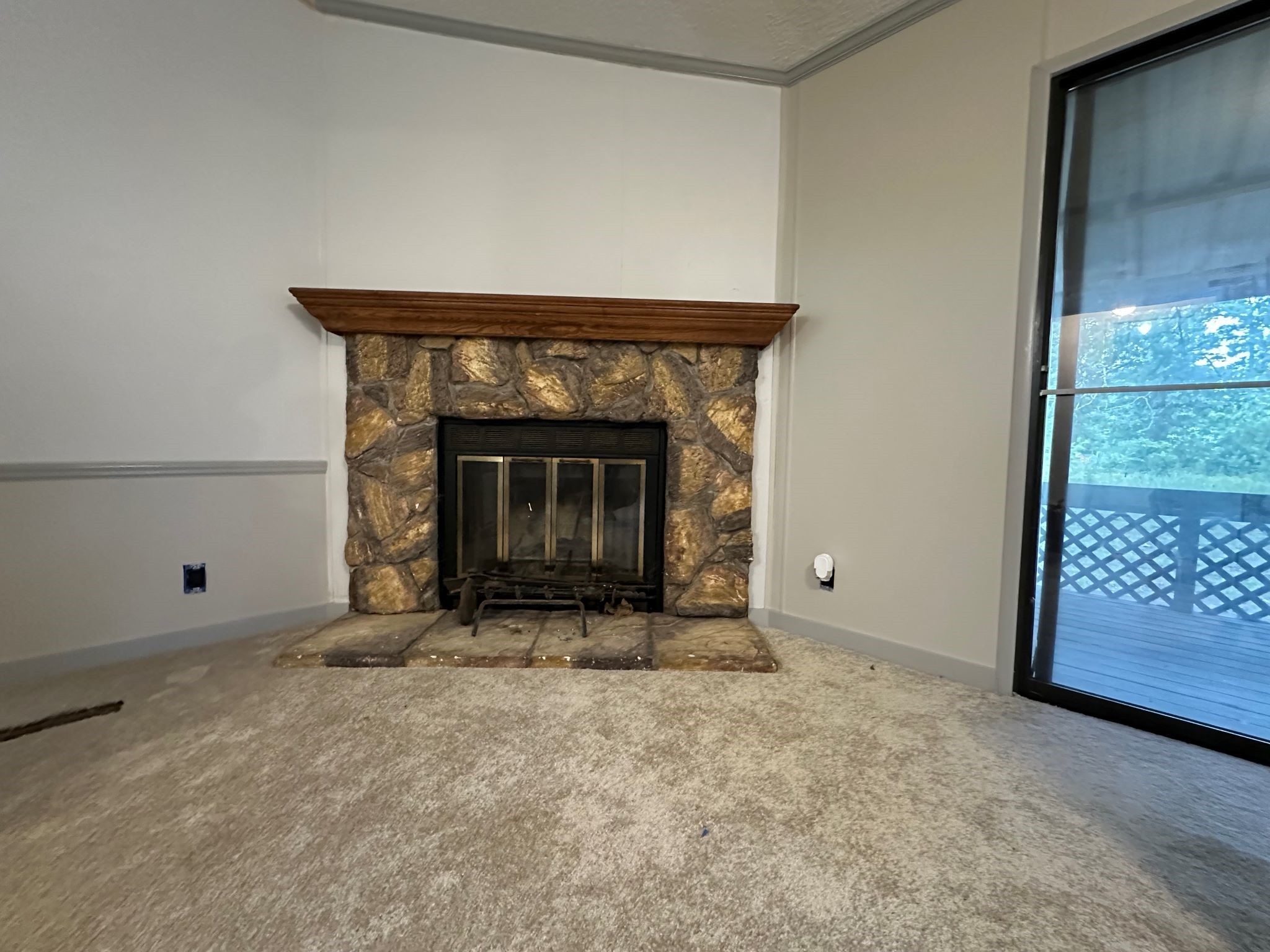195 Charlies Lane Trinity, TX 75862 - Photo 16 of 25 a view of empty room with a fireplace