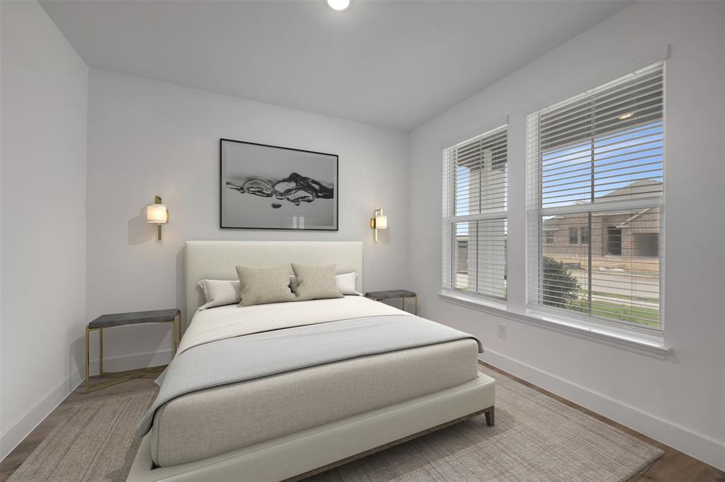 1004 Ashcroft Lane Justin, TX 76247 - Photo 17 of 39 a bedroom with a large bed and a window