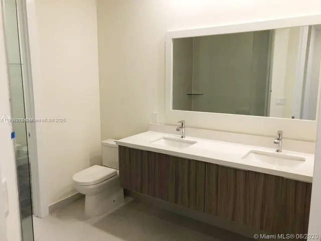 a bathroom with a sink and a toilet