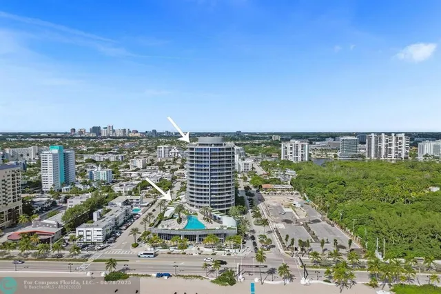 a kitchen with stainless steel appliances a sink stove and cabinets