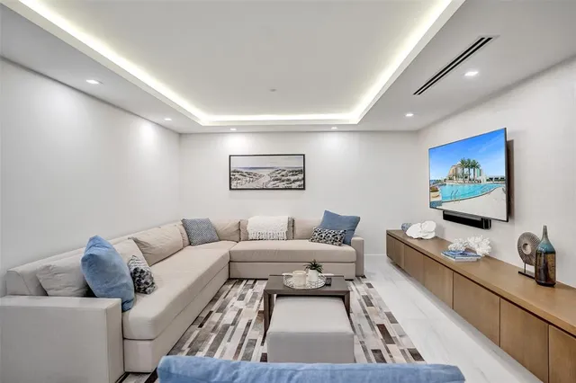 a kitchen with stainless steel appliances a sink stove and cabinets