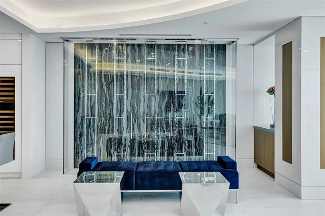 a kitchen with a white cabinets and stove