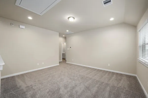 a backyard of a house with lots of green space