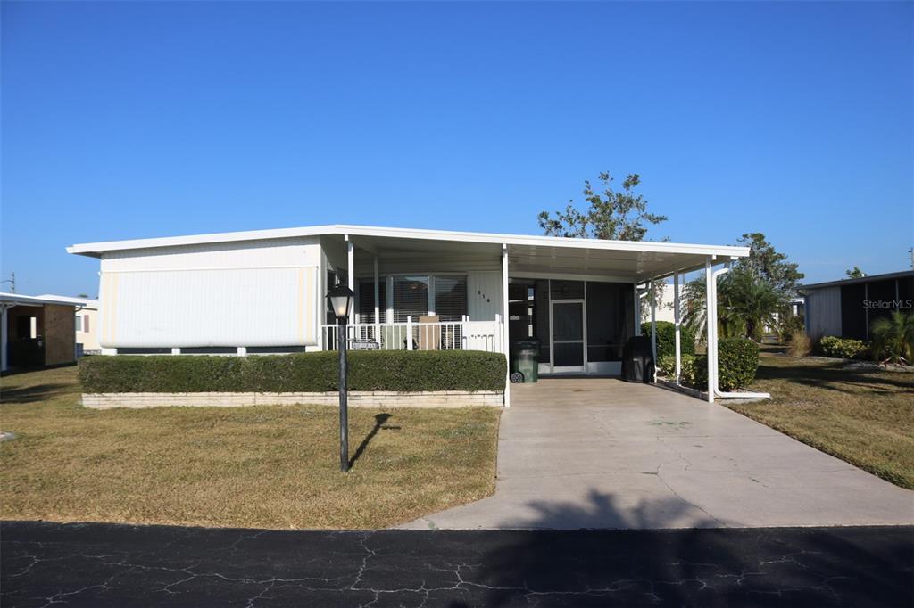 316 Estrada Street North Port, FL 34287 - Photo 2 of 59 a view of a house with entertaining space