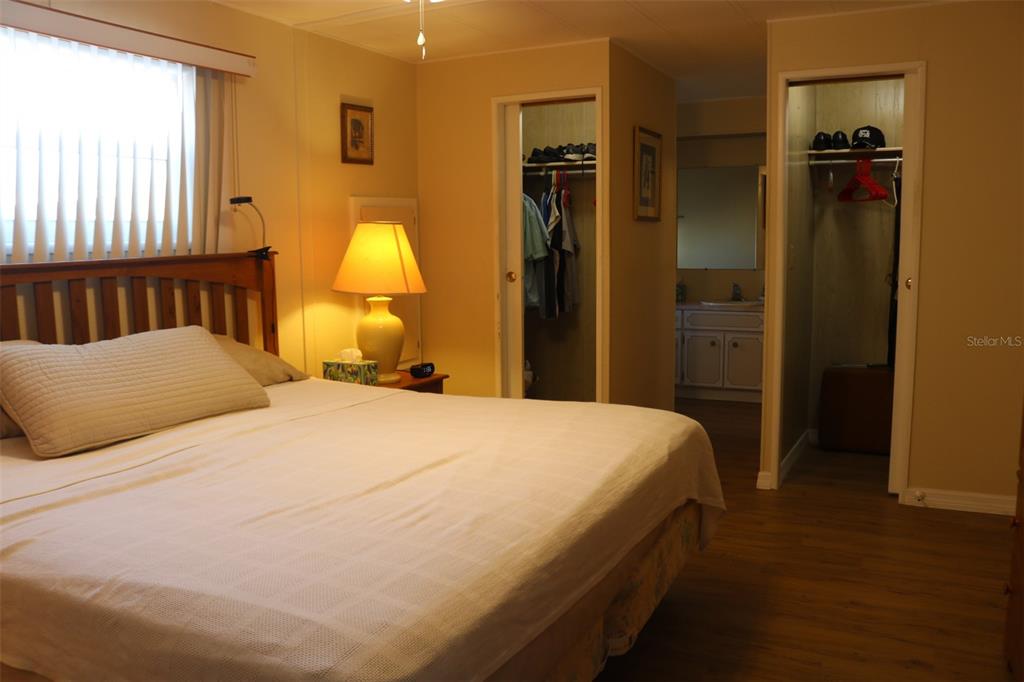 316 Estrada Street North Port, FL 34287 - Photo 22 of 59 a bedroom with a bed and a window