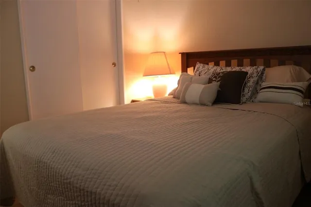 a bathroom with a shower and a sink