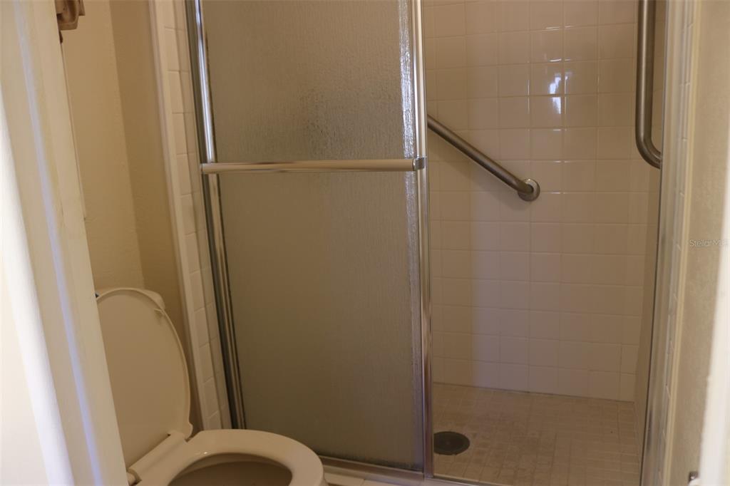 316 Estrada Street North Port, FL 34287 - Photo 29 of 59 a bathroom with a shower