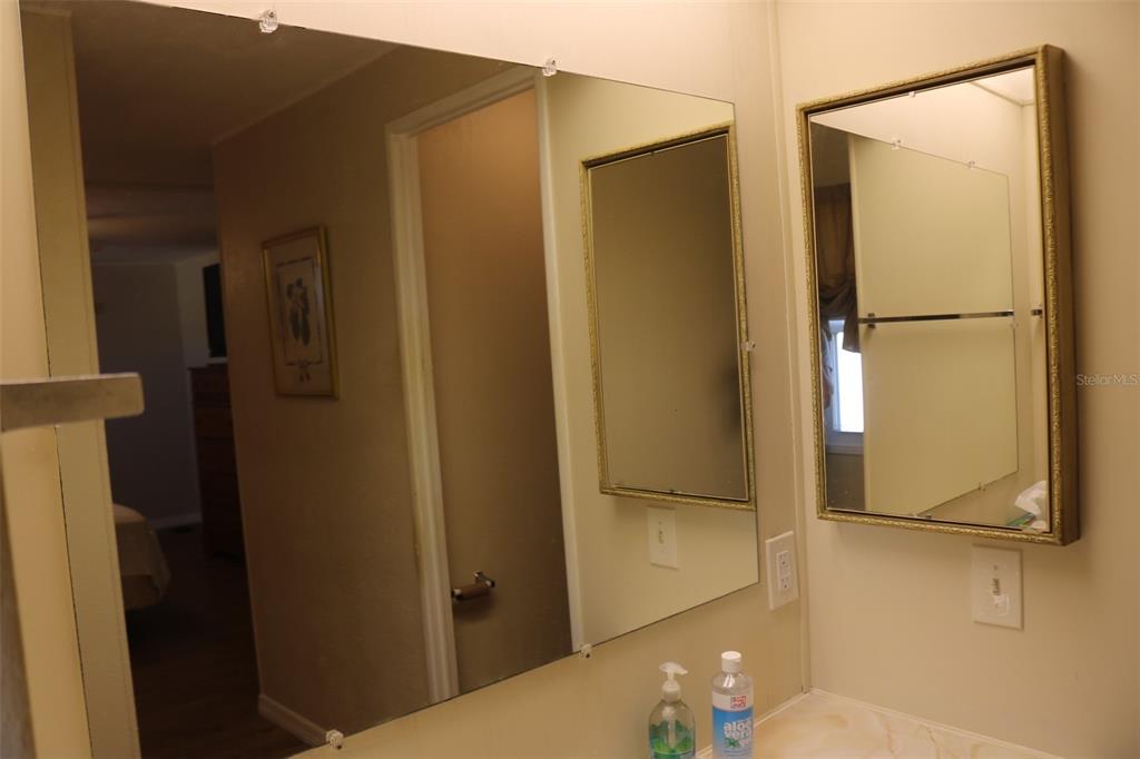 316 Estrada Street North Port, FL 34287 - Photo 30 of 59 a bathroom with a shower and a sink