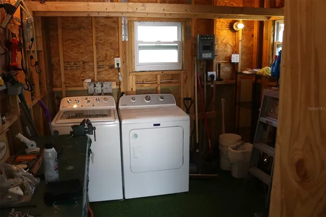 a view of swimming pool with outdoor seating