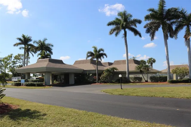 a view of swimming pool with outdoor seating and yard