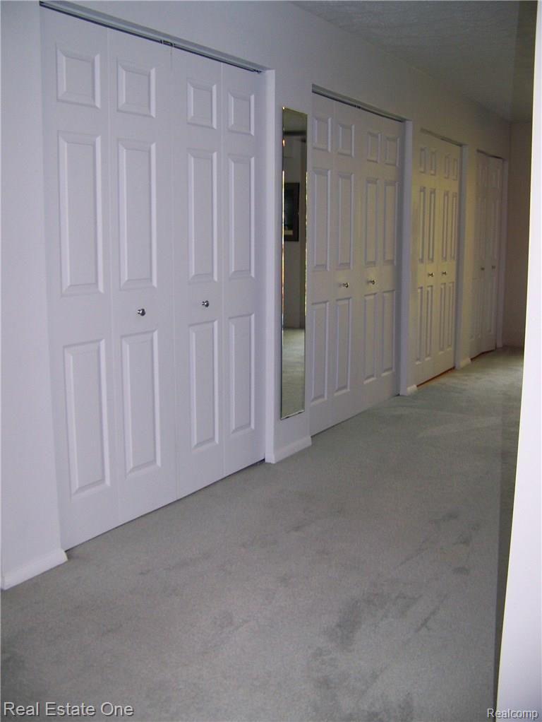 3392 Grant Rochester, MI 48309 - Photo 18 of 26 Grant Mstr Row of Closets.JPG