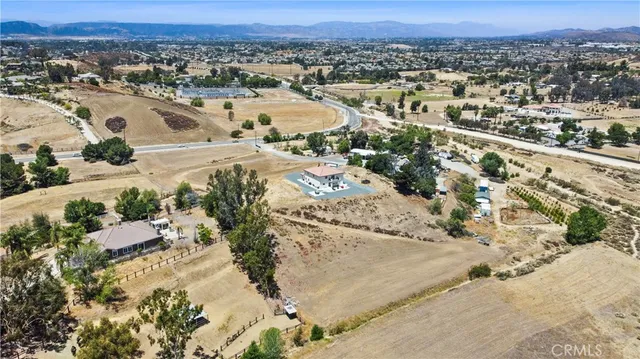 a view of a swimming pool with an ocean view