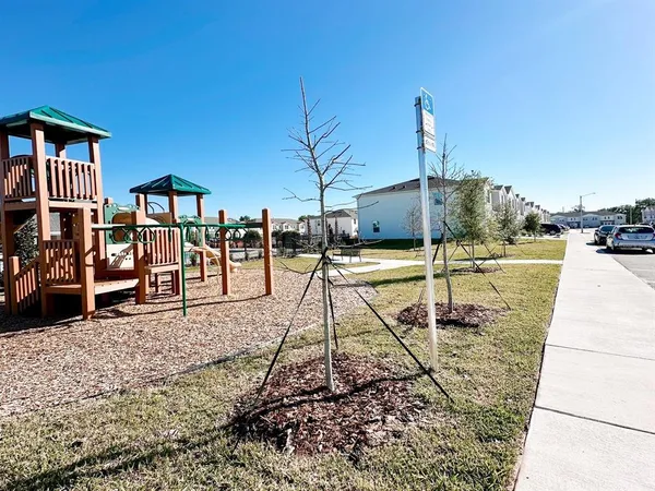 a view of a park with swings