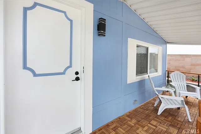 a view of balcony with furniture