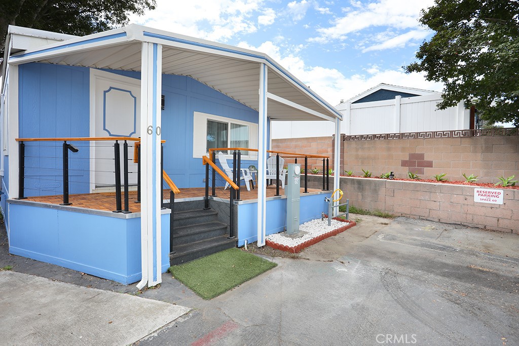 17261 Gothard Street, Unit 60 Huntington Beach, CA 92647 - Photo 23 of 27 a view of house with a outdoor space
