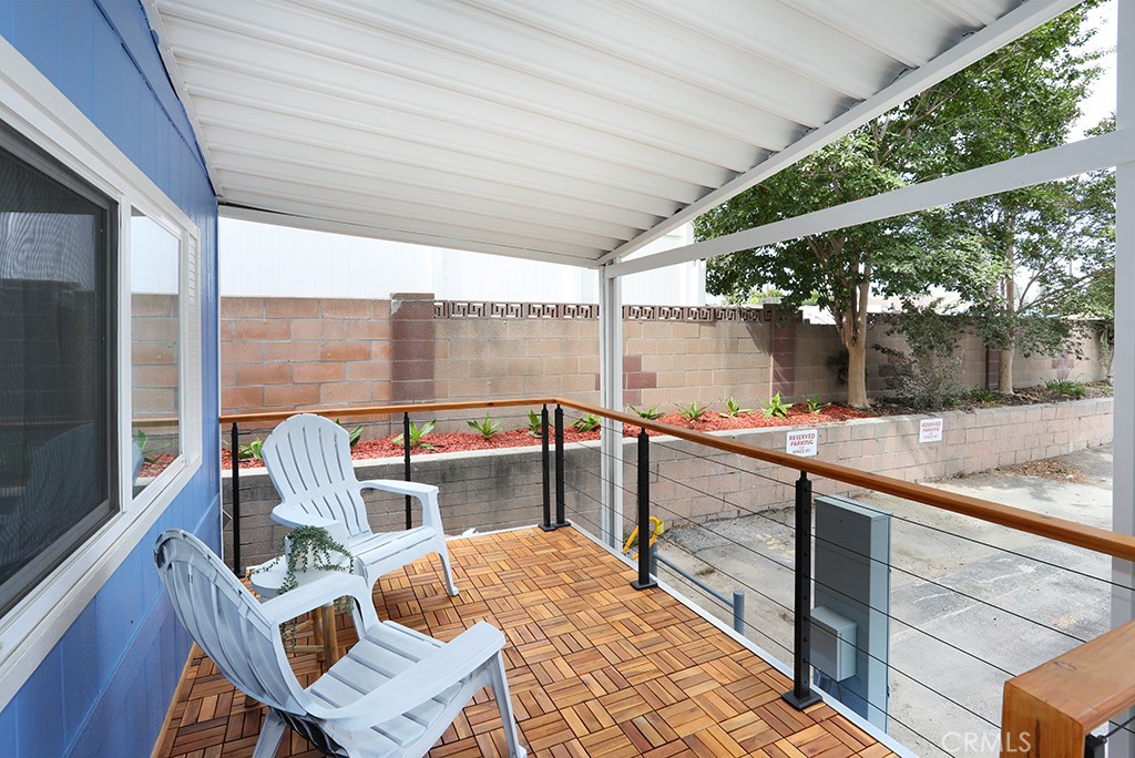 17261 Gothard Street, Unit 60 Huntington Beach, CA 92647 - Photo 25 of 27 a view of outdoor space with seating area