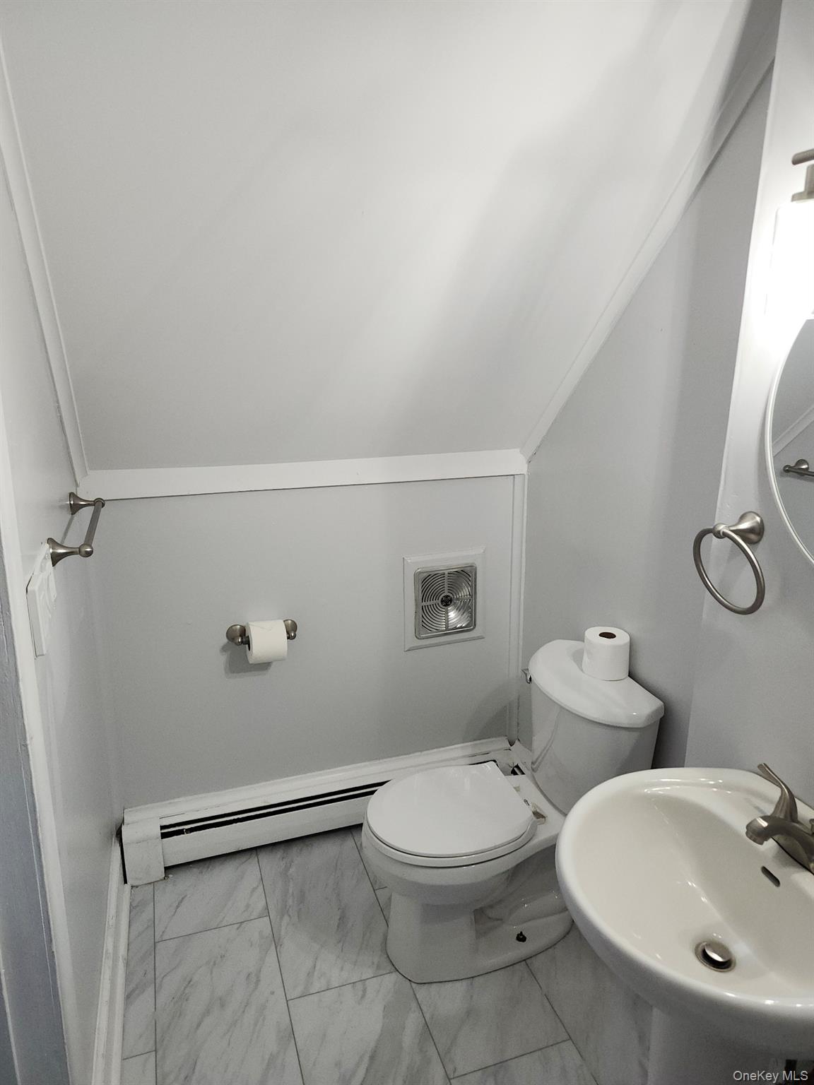 165 South Cross Road, Unit 3 Staatsburg, NY 12580 - Photo 12 of 15 a bathroom with a toilet a sink and mirror