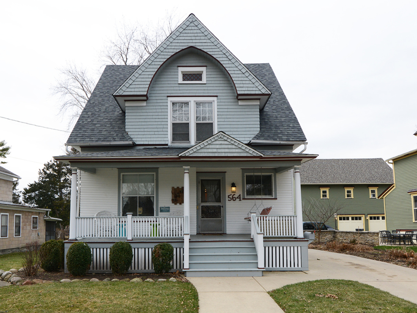 564 North Spring Street Elgin, IL 60120 - Photo 1 of 27 a front view of a house with a yard