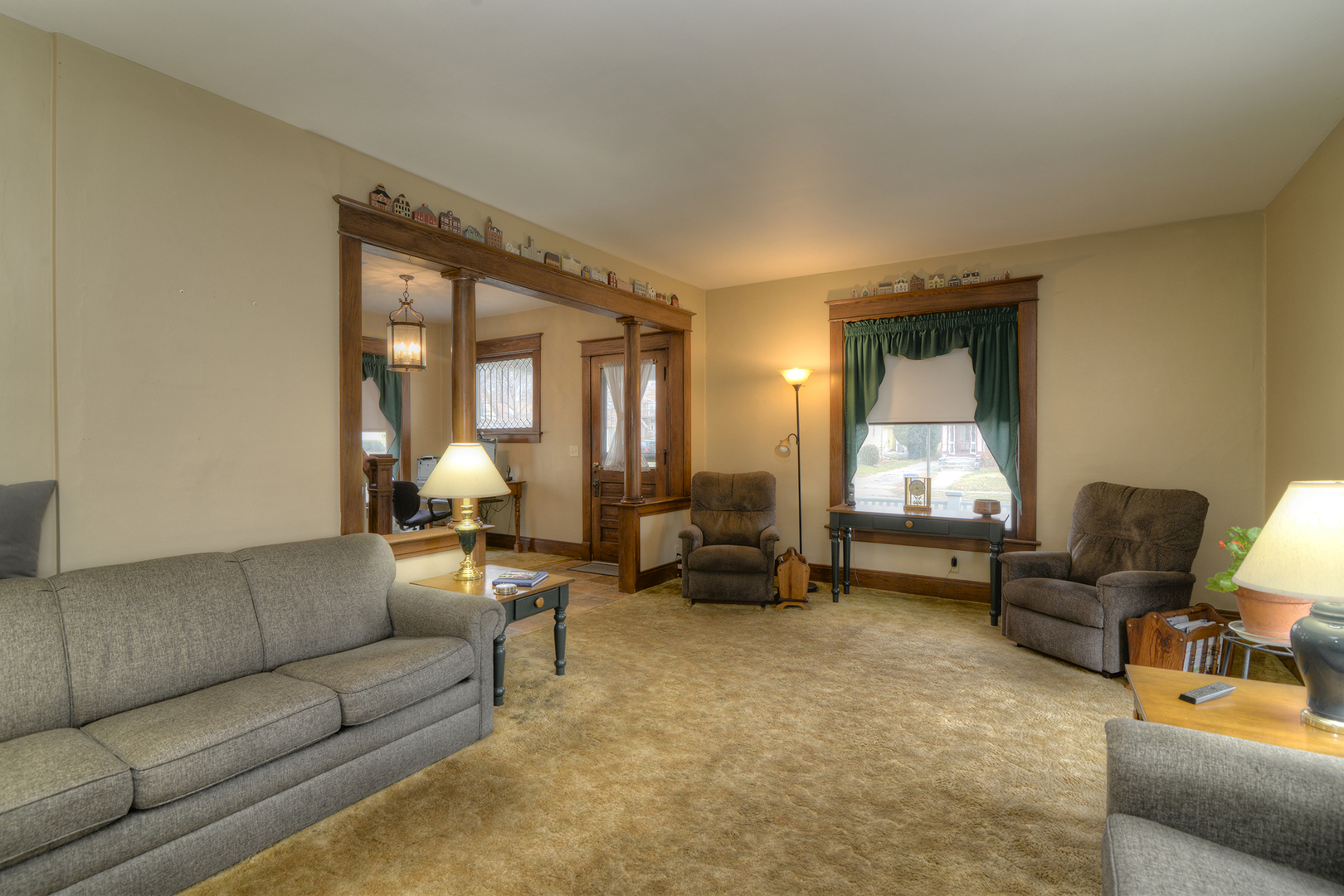 564 North Spring Street Elgin, IL 60120 - Photo 5 of 27 a living room with furniture and a large window