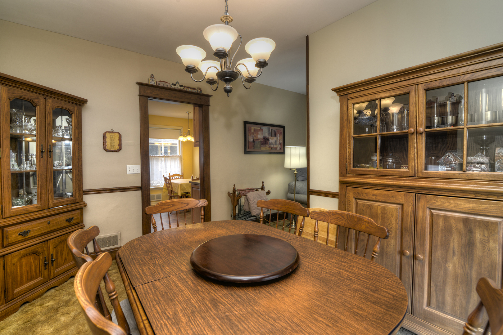 564 North Spring Street Elgin, IL 60120 - Photo 8 of 27 a dining room with wooden floor and large windows