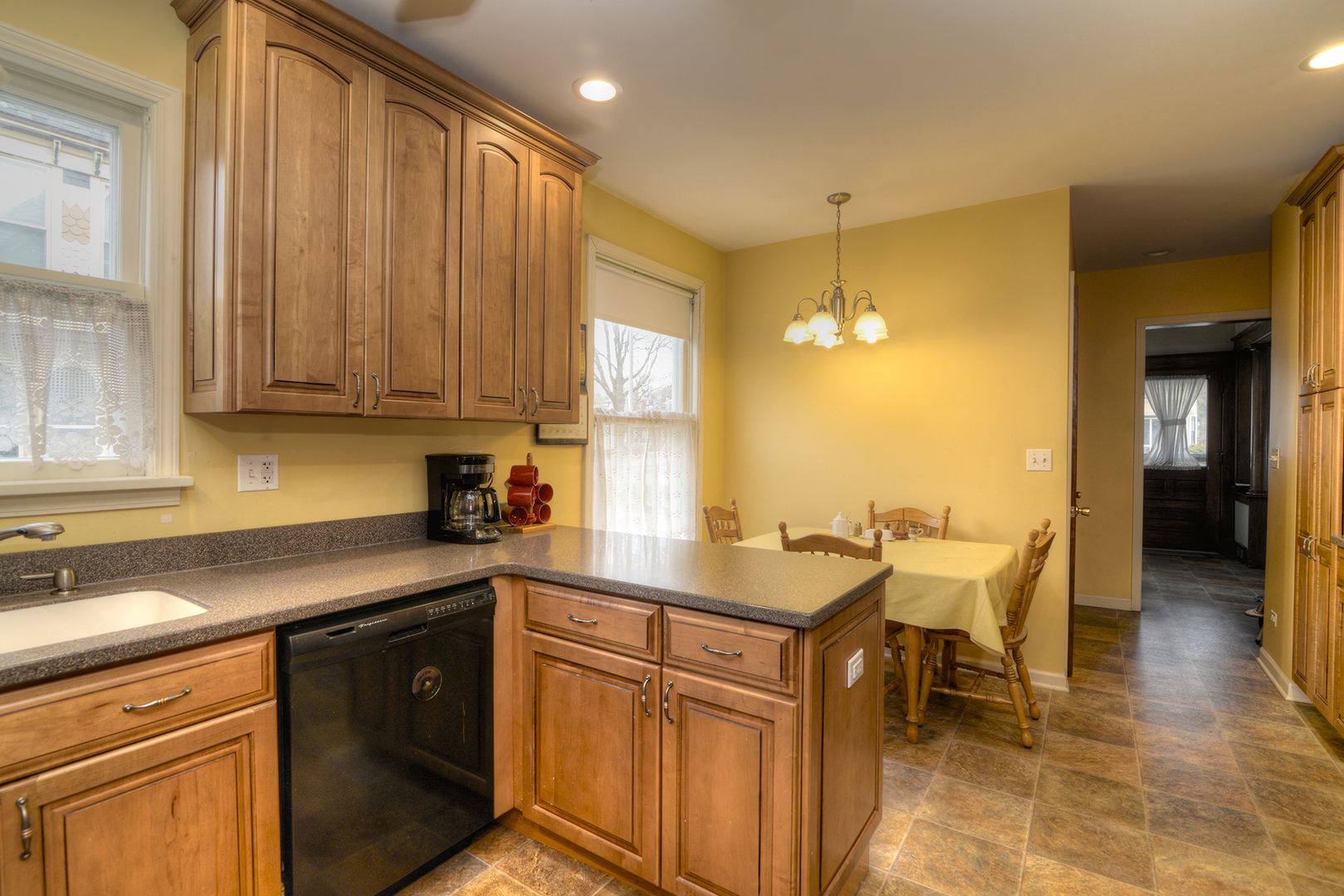 564 North Spring Street Elgin, IL 60120 - Photo 10 of 27 a kitchen with a sink and cabinets