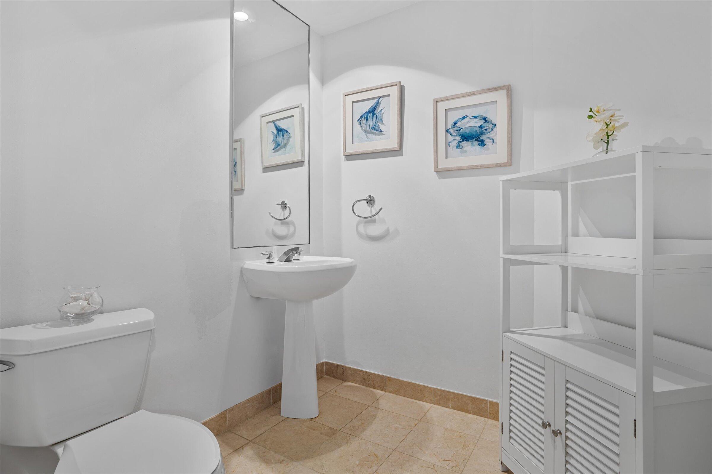 801 Brickell Key Boulevard, Unit 2805 Miami, FL 33131 - Photo 24 of 42 a bathroom with a sink toilet and vanity