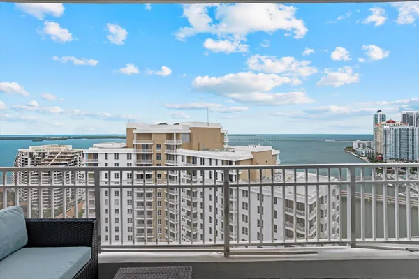 a view of a balcony with city view