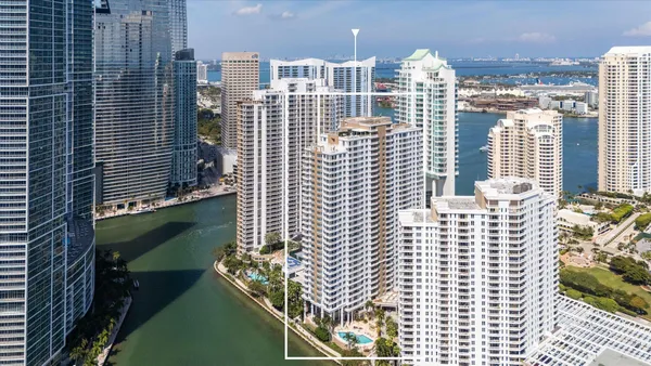 a view of a city with tall buildings