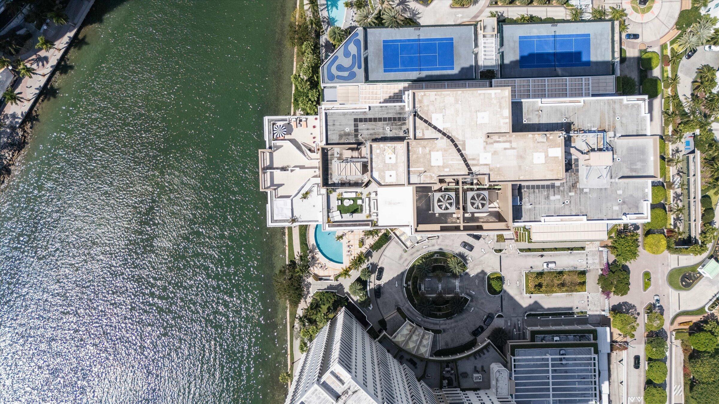 801 Brickell Key Boulevard, Unit 2805 Miami, FL 33131 - Photo 35 of 42 a view of roof deck with wooden fence