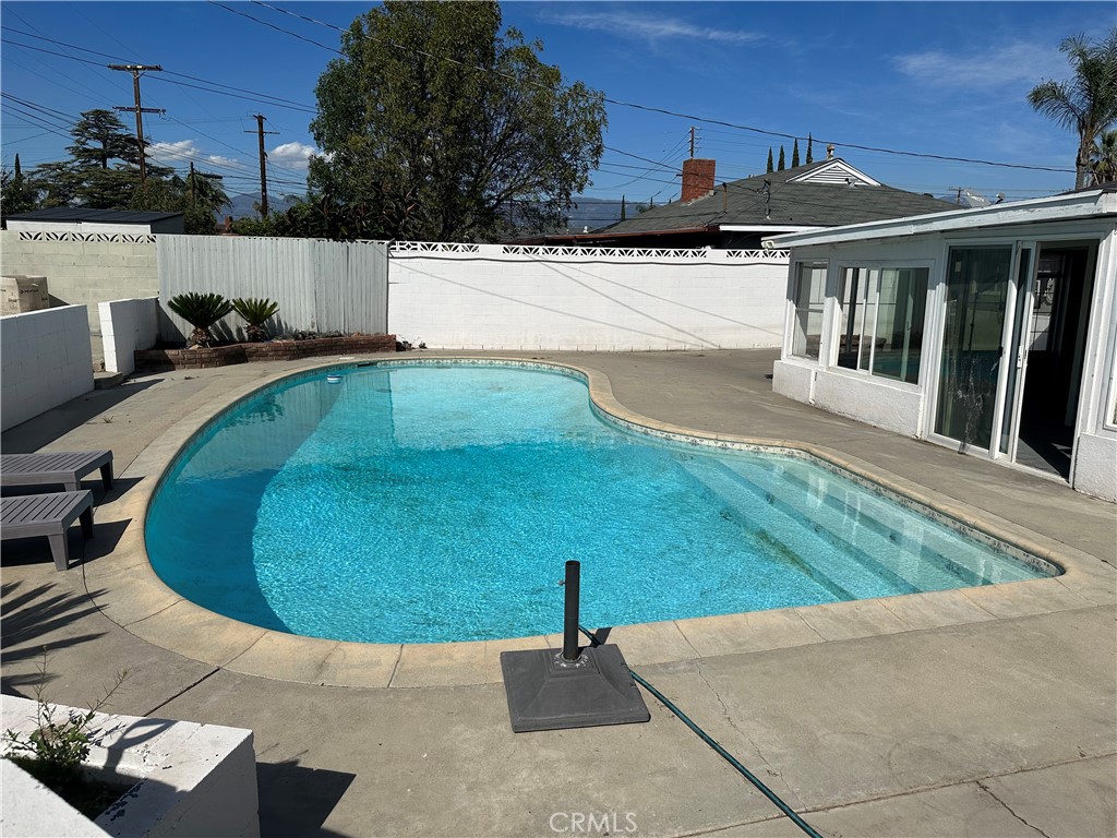 114 South Acacia Avenue Rialto, CA 92376 - Photo 22 of 27 a view of outdoor space yard deck patio and fire pit