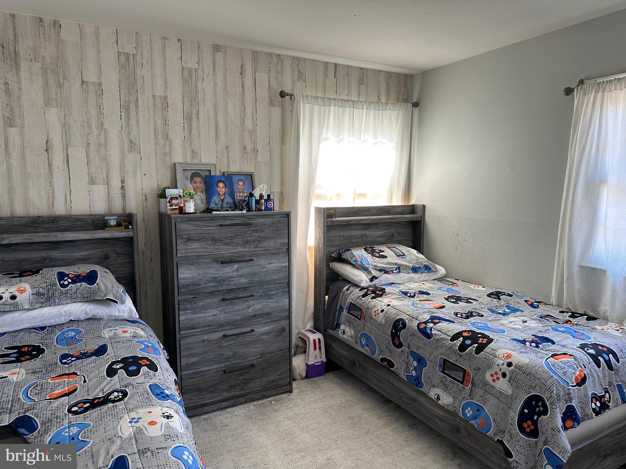 28 Cold Spring Road Hamilton, NJ 08619 - Photo 20 of 34 a bedroom with a bed and a window