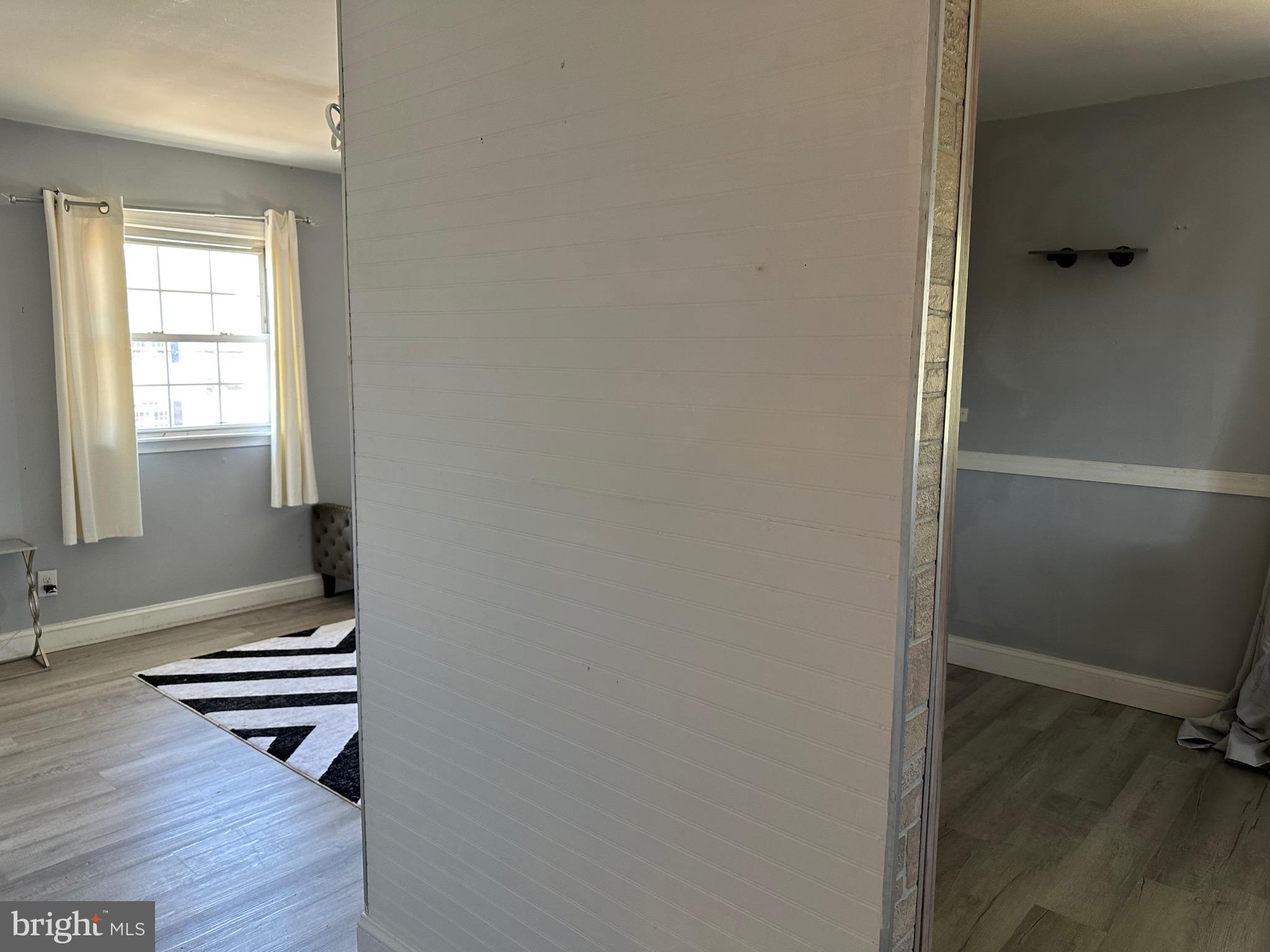 28 Cold Spring Road Hamilton, NJ 08619 - Photo 27 of 34 an empty room with wooden floor and window