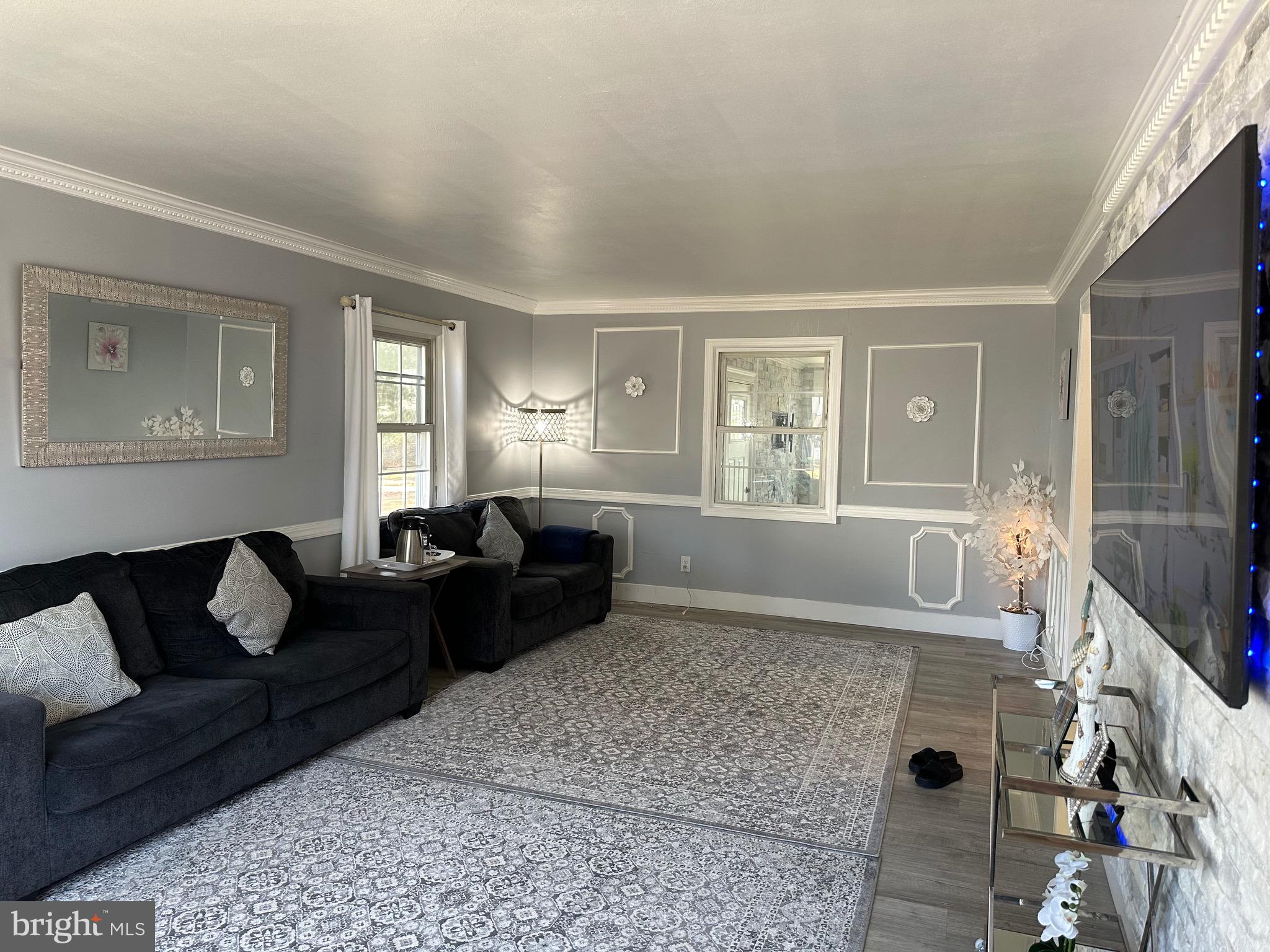 28 Cold Spring Road Hamilton, NJ 08619 - Photo 3 of 34 a living room with furniture and a window