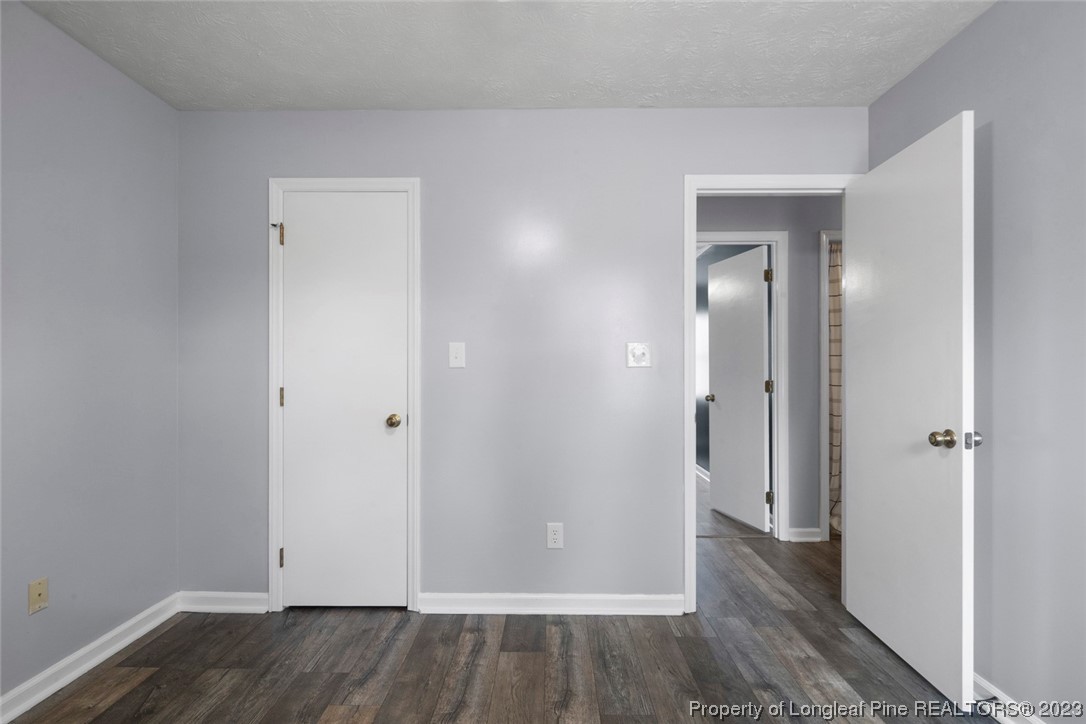 5843 Labonte Drive Hope Mills, NC 28348 - Photo 27 of 43 a view of a hallway with wooden floor