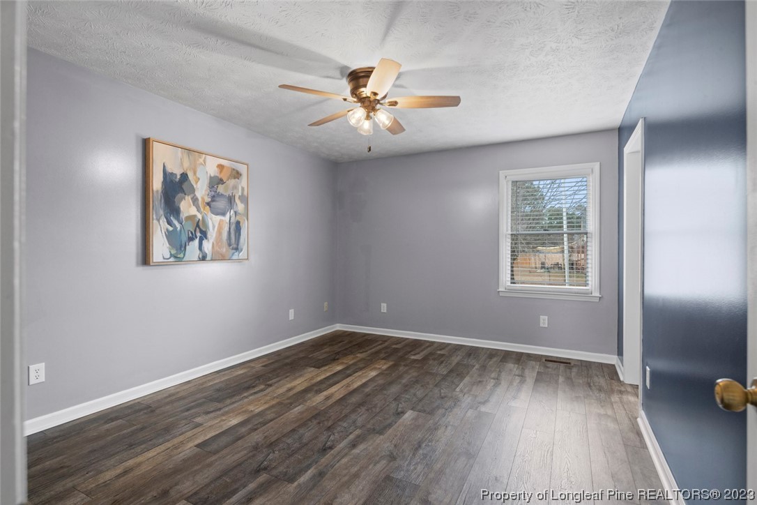 5843 Labonte Drive Hope Mills, NC 28348 - Photo 28 of 43 wooden floor in an empty room with a window