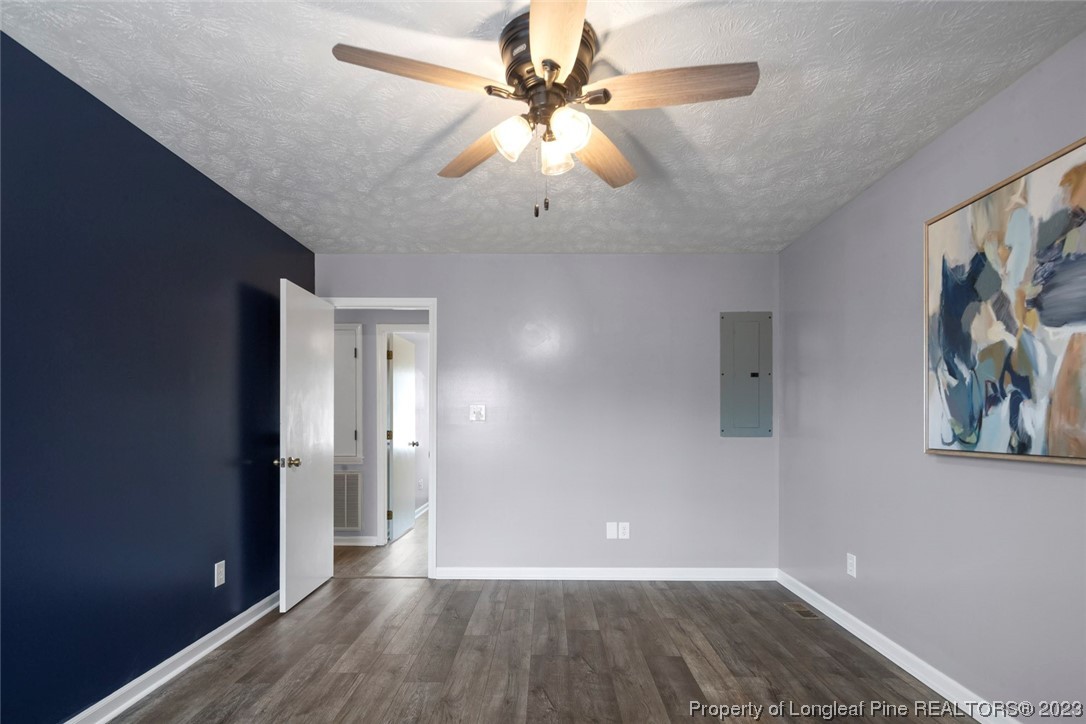 5843 Labonte Drive Hope Mills, NC 28348 - Photo 29 of 43 wooden floor in an empty room with a window