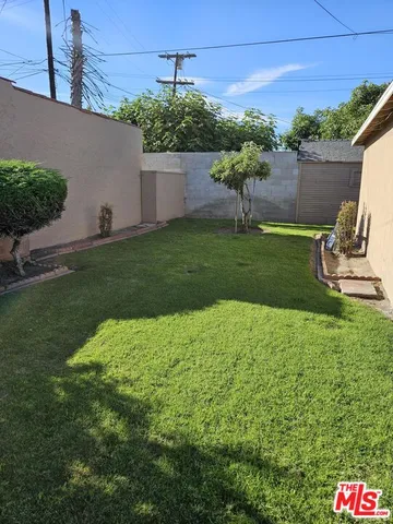 a view of a garden with a bench