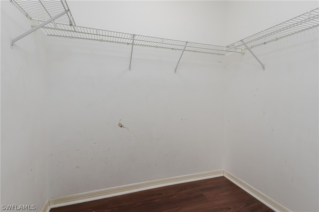 234 Connecticut Road Lehigh Acres, FL 33936 - Photo 12 of 19 a view of a room with racks on the wall