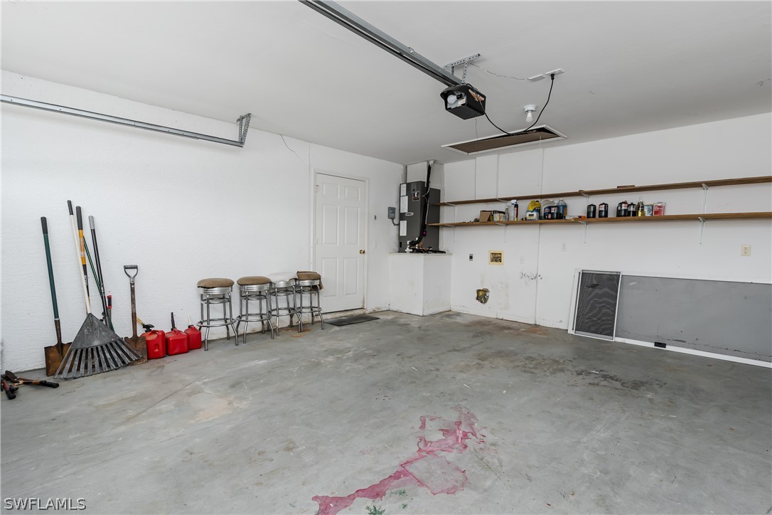 234 Connecticut Road Lehigh Acres, FL 33936 - Photo 19 of 19 a view of a room with gym equipment