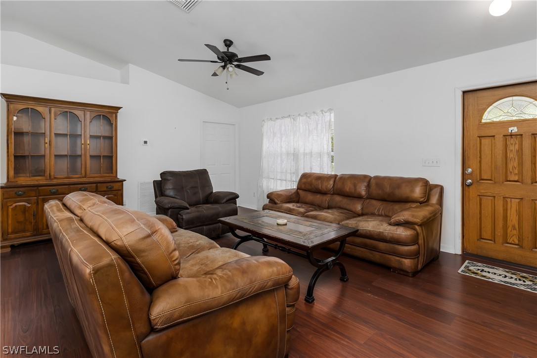 234 Connecticut Road Lehigh Acres, FL 33936 - Photo 7 of 19 a living room with furniture